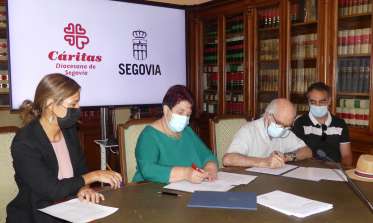 Firma convenio de Cáritas